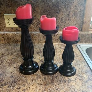 Three Black Candle Sticks